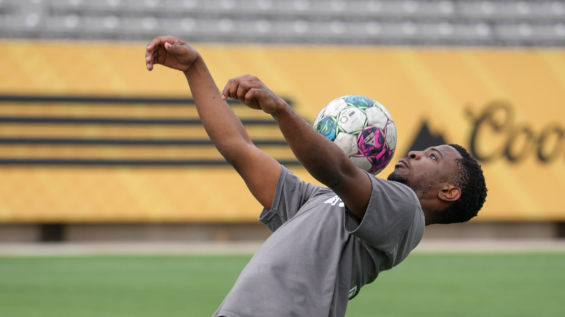 Student playing soccer